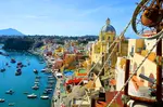Cottages of a hundred hues and shades tumble to the shores of azure Mediterranean seas - this is the Italian island of Procida, an island you will love forever.