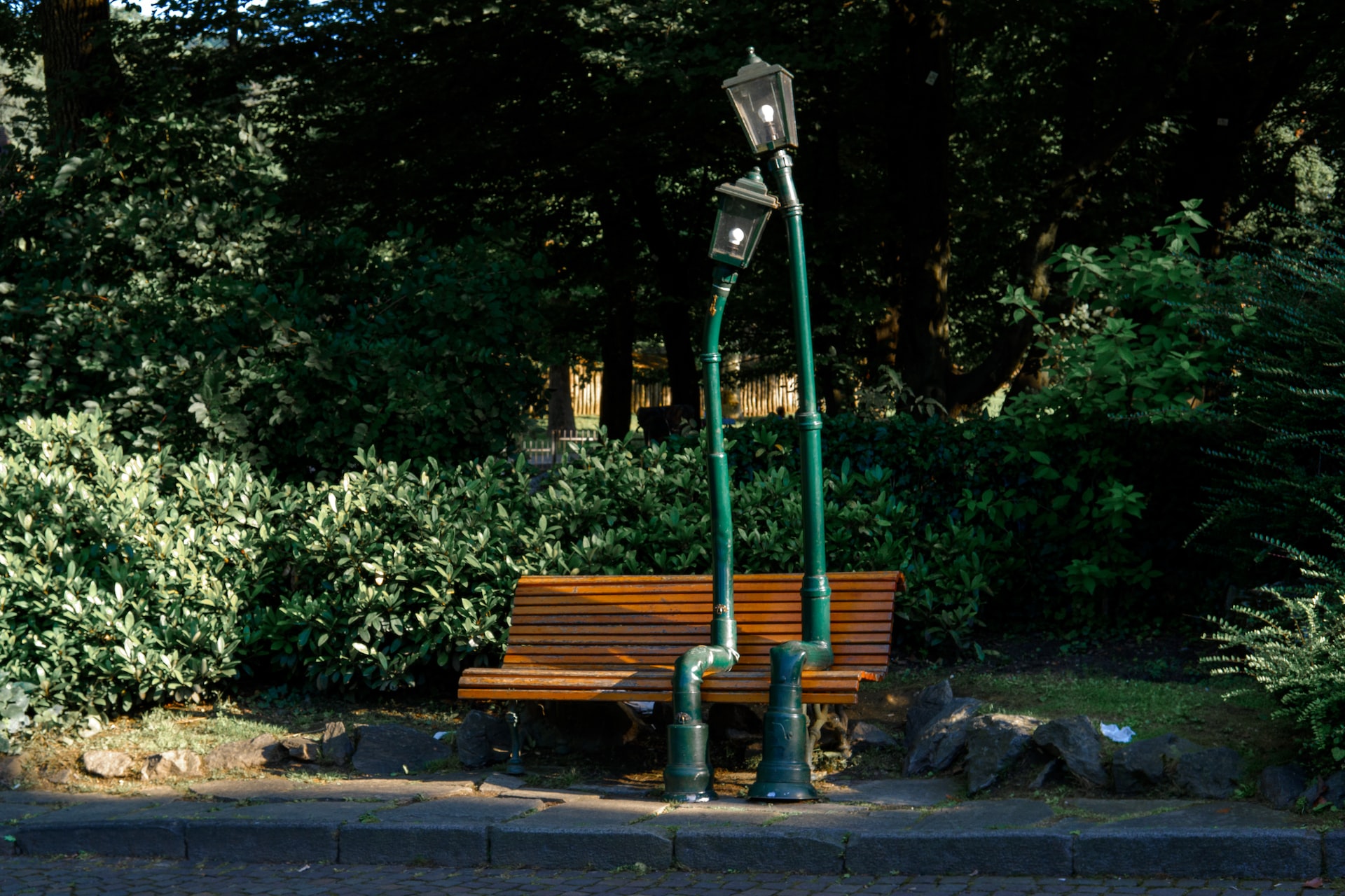 Lamp posts on a bench Park Valentino Turin Lamp posts on a bench Park Valentino Turin